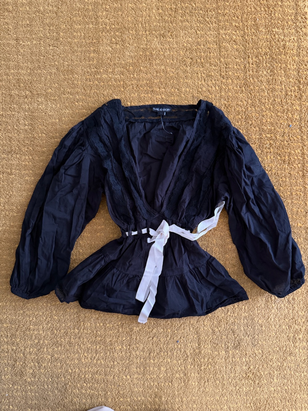 Black Blouse with White Waist Tie and Lace Details